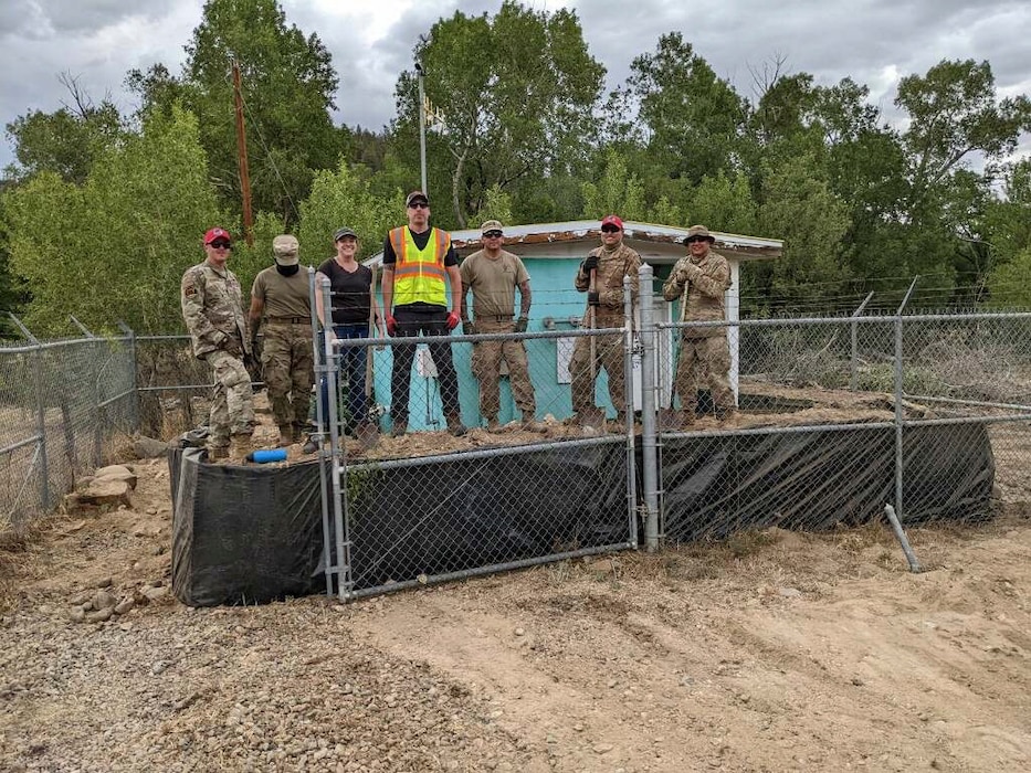 MORA, N.M. – The New Mexico National Guard and the USACE Flood Response Team built waterproof flood barriers around local well houses after the Hermits Peak/Calf Canyon Fire, June 2022. Photo by Capt. Robert Zebrowski.