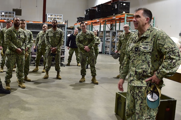 Rear Adm. Matthew Case, Naval Medical Forces Atlantic (NMFL) commander and director, Tidewater Market, visits with biomedical equipment technicians, logistics and retail service specialists from across the Navy Medicine enterprise who assembled the U.S. Navy’s first En-Route Care System (ERCS) and the Expeditionary Resuscitative Surgical System (ERSS).