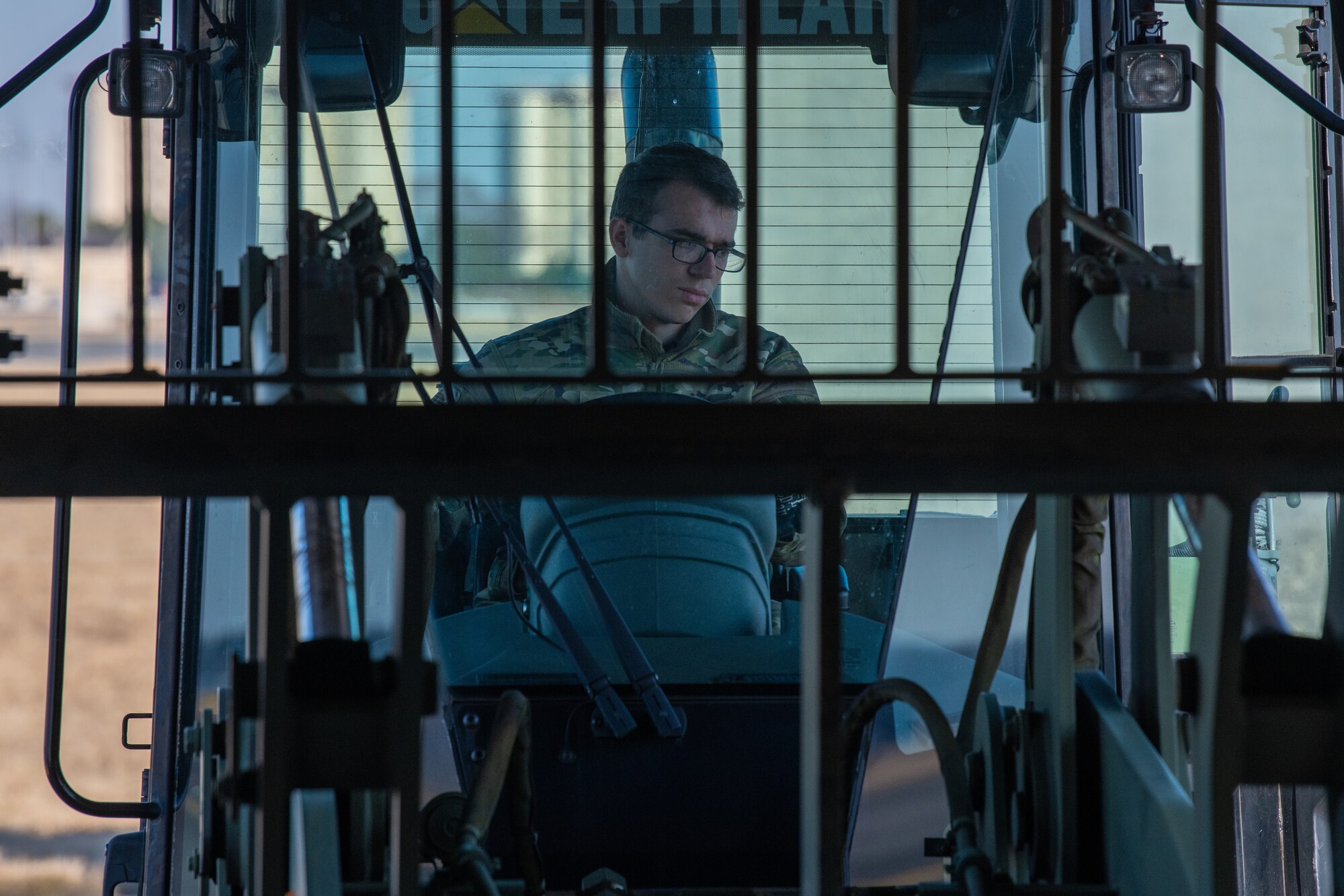 Airman operates a 10K all-terrain forklift