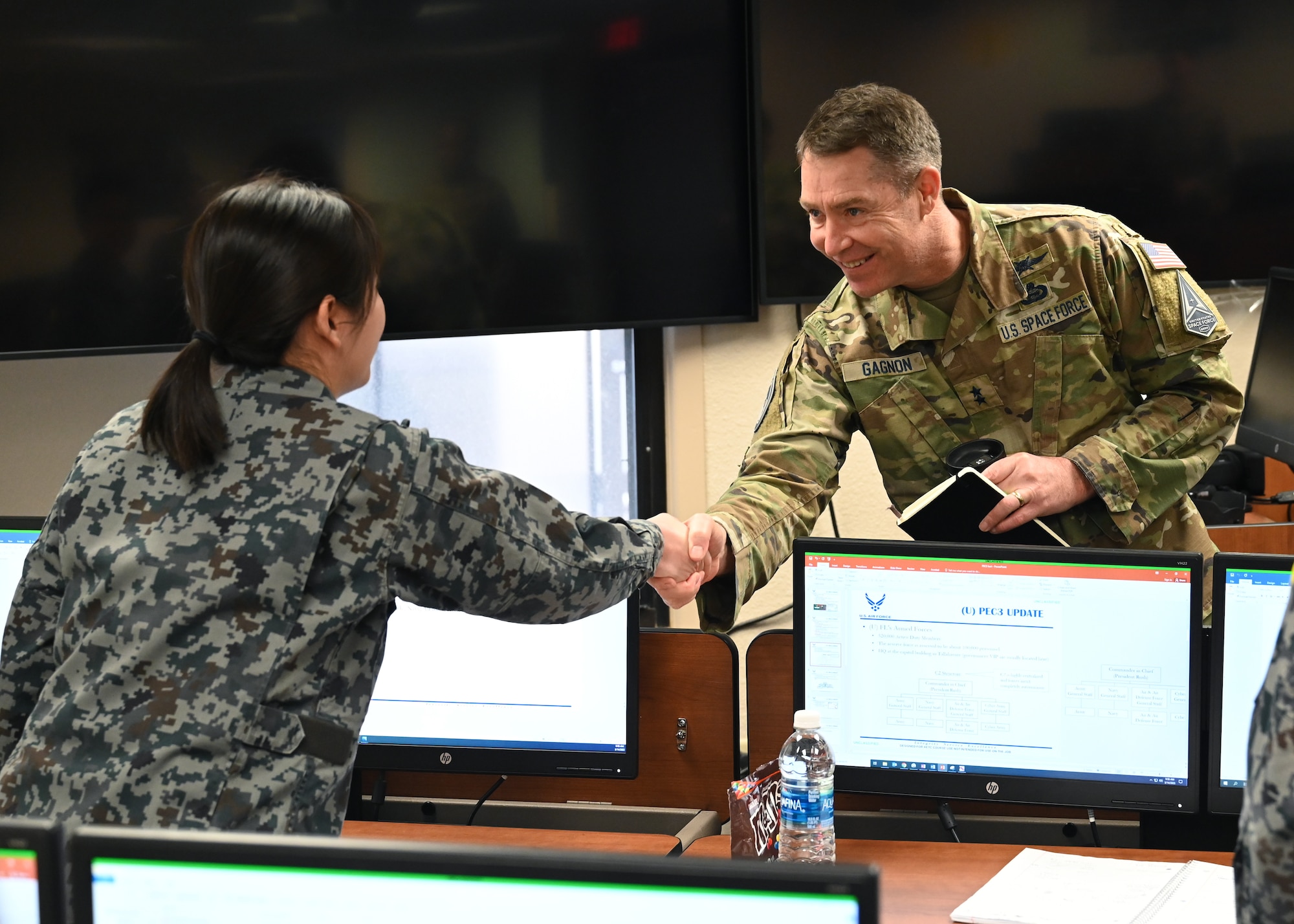 U.S. Space Force Maj. Gen. Gregory Gagnon, Deputy Chief of Space Operations for Intelligence, meets with international intelligence officers, Goodfellow Air Force Base, Texas, Mar. 14, 2023. The International Intelligence Officer School has three classes ranging from three weeks to three months long, with up to 20 students at a time. (U.S. Air Force photo by Airman 1st Class Zachary Heimbuch)