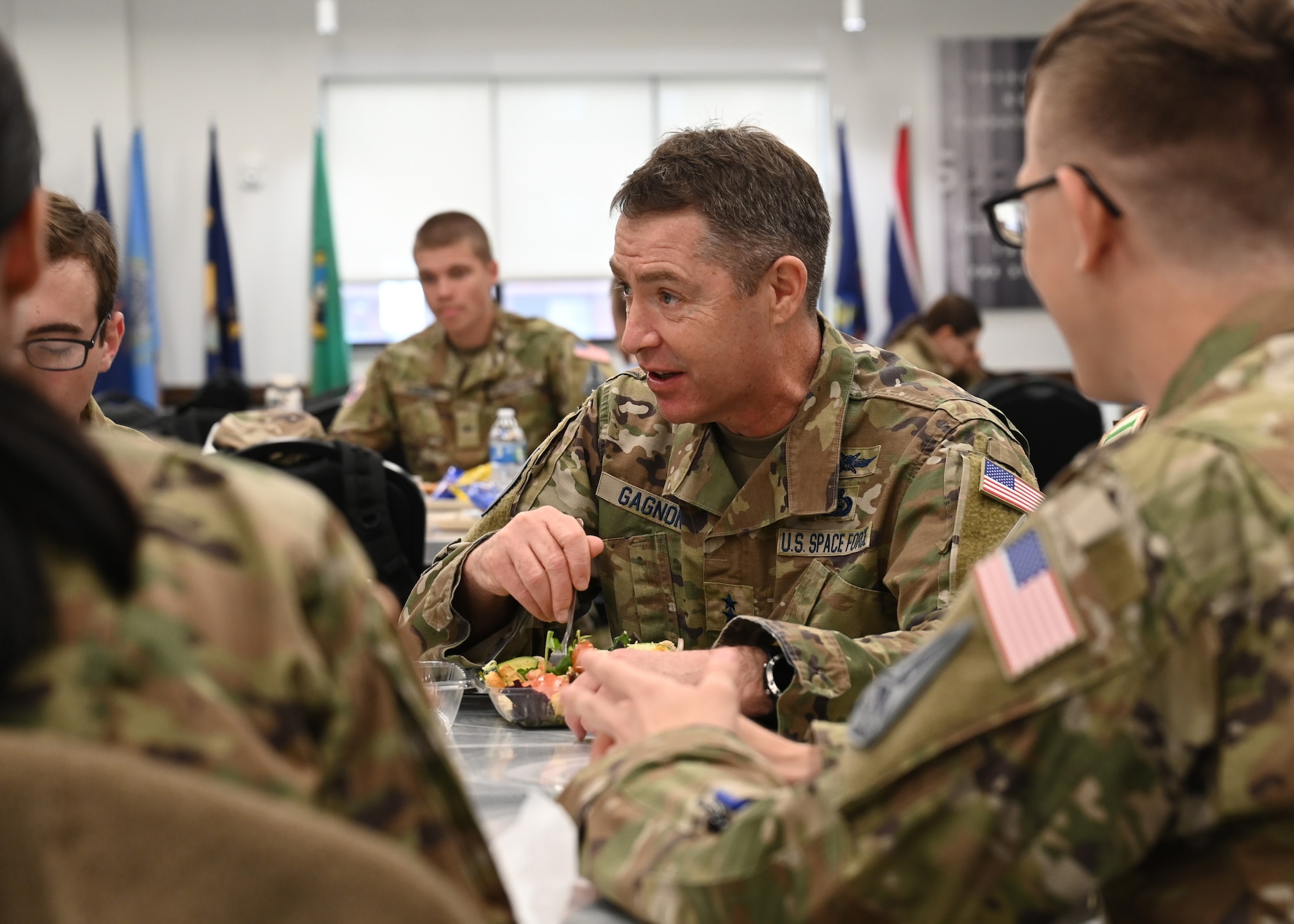 U.S. Space Force Maj. Gen. Gregory Gagnon, Deputy Chief of Space Operations for Intelligence, meets with Guardian students for lunch, Goodfellow Air Force Base, Texas, Mar. 14, 2023. Gagnon and the students discussed the student life in the training environment of Goodfellow and what to expect once graduating from technical training. (U.S. Air Force photo by Airman 1st Class Zachary Heimbuch)