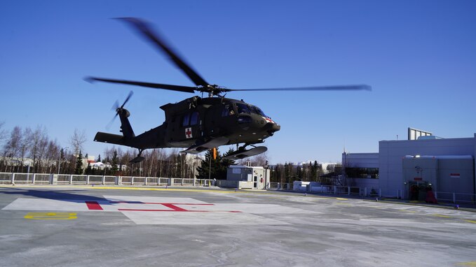 An Alaska Army National Guard HH-60M Black Hawk Helicopter assigned to Golf Company, Detachment 2, 2-211th General Support Aviation Battalion, departs after transferring a notional casualty to Providence Alaska Medical Center in Anchorage, Alaska, March 13, 2023