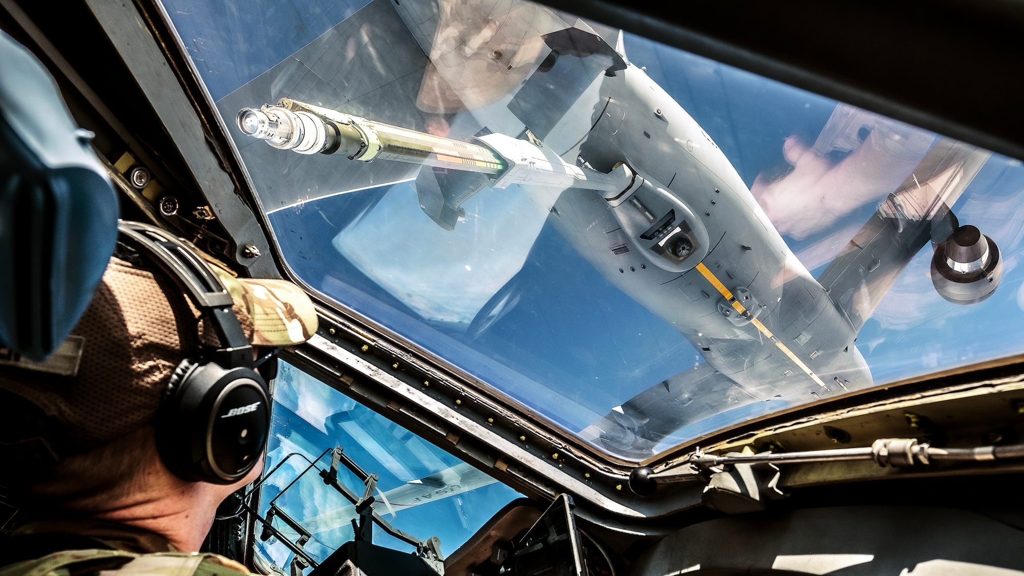 U.S. Air Force Capt. Christopher Allen, 6th Airlift Squadron deputy chief of squadron training, co-pilots a C-17 Globemaster to be refueled by a KC-46 Pegasus over the Eastern seaboard, Mar. 9, 2023.