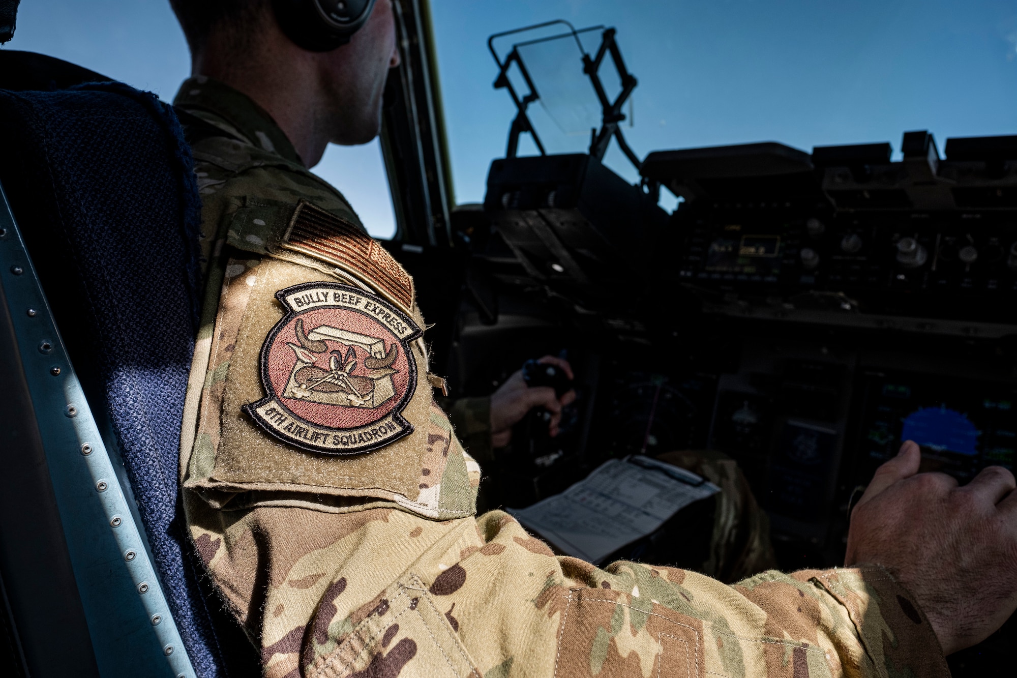 U.S. Air Force Maj. Brenden Crawford, 6th Airlift Squadron pilot, pilots a C-17 Globemaster over the Eastern seaboard, Mar. 9, 2023.