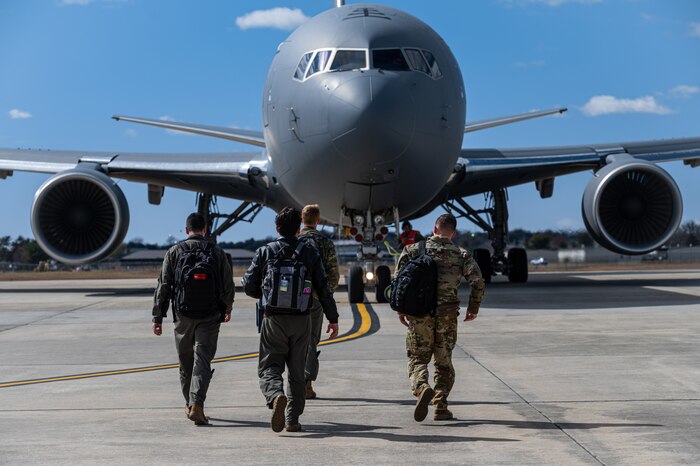 U.S. Air Force Capt. Christopher Allen, 6th Airlift Squadron deputy chief of squadron training, co-pilots a C-17 Globemaster to be refueled by a KC-46 Pegasus over the Eastern seaboard, Mar. 9, 2023.