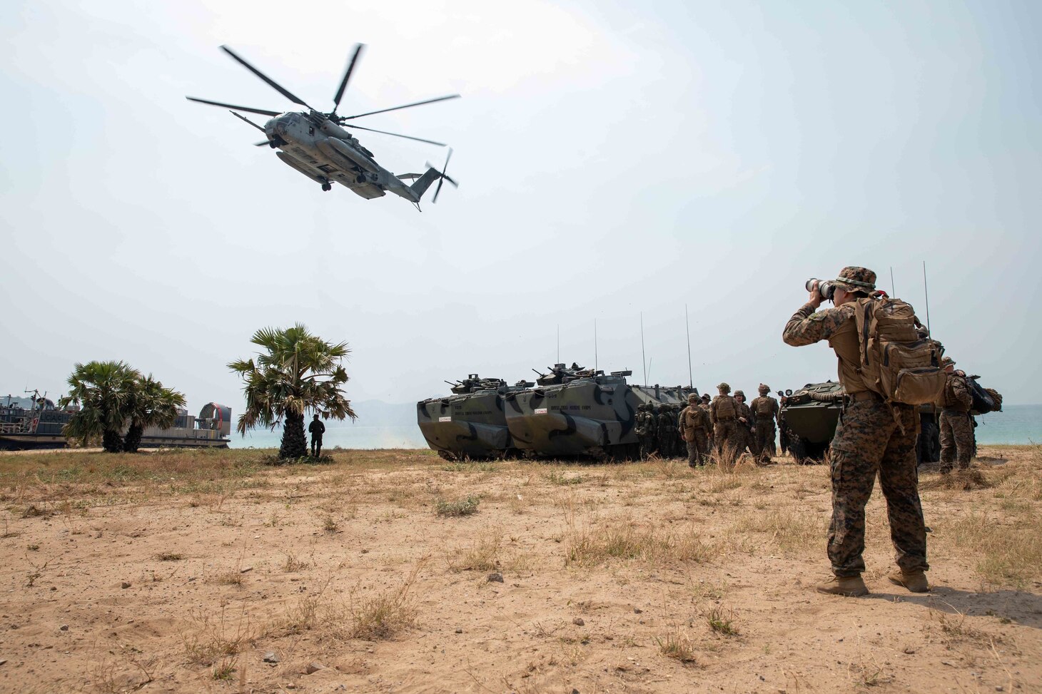 An MH-53E Sea Dragon, assigned to 13th Marine Expeditionary Unit (MEU), prepares to land during exercise Cobra Gold 2023, March 2, 2023 in Hatyao, Thailand. Exercise Cobra Gold 2023, in its 42nd iteration, is one of the largest multilateral theater security cooperation exercises in the Indo-Pacific and reflects the U.S. commitment to allies and partners, providing a continuous and reliable platform to train, prepare, and enhance regional interoperability. The Makin Island Amphibious Ready Group, comprised of Makin Island and amphibious transport dock USS Anchorage (LPD 23) and USS John P. Murtha (LPD 26), is operating in the U.S. 7th Fleet area of operations with the embarked 13th Marine Expeditionary Unit to enhance interoperability with Allies and partners and serve as a ready-response force to defend peace and maintain stability in the Indo-Pacific region. (U.S. Navy photo by Mass Communication Specialist 3rd Class Kendra Helmbrecht)