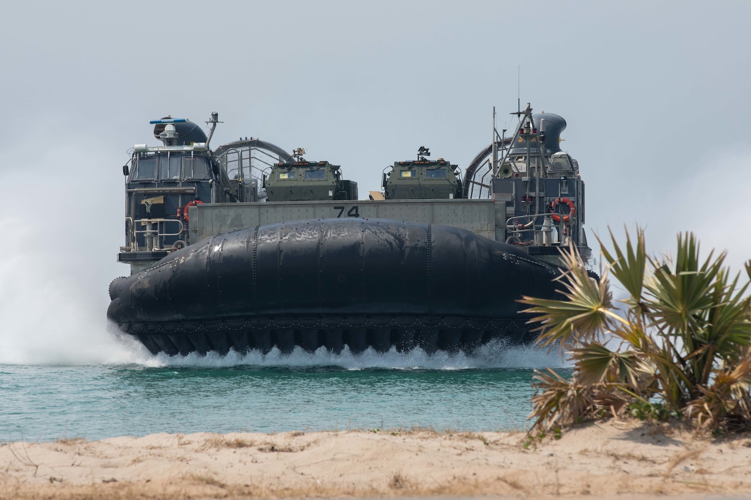 A landing craft, air cushion (LCAC), assigned to Assault Craft Unit (ACU) 5, currently embarked with amphibious assault ship USS Makin Island (LHD 8), approaches Hatyao beach during exercise Cobra Gold 2023, March 3, 2023 in Hatyao,Thailand. Exercise Cobra Gold 2023, in its 42nd iteration, is one of the largest multilateral theater security cooperation exercises in the Indo-Pacific and reflects the U.S. commitment to allies and partners, providing a continuous and reliable platform to train, prepare, and enhance regional interoperability. The Makin Island Amphibious Ready Group, comprised of Makin Island and amphibious transport dock USS Anchorage (LPD 23) and USS John P. Murtha (LPD 26), is operating in the U.S. 7th Fleet area of operations with the embarked 13th Marine Expeditionary Unit to enhance interoperability with Allies and partners and serve as a ready-response force to defend peace and maintain stability in the Indo-Pacific region. (U.S. Navy photo by Mass Communication Specialist 3rd Class Kendra Helmbrecht)