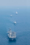 From bottom to top amphibious assault ship USS Makin Island (LHD 8), Royal Thai Navy landing platform dock HTMS Angthong (LPD 791), Republic of Korea Navy tank landing ship ROKS Il Chul Bong (LST 688), and landing transport dock USS John P. Murtha (LPD 26)during operation Cobra Gold 2023, March 3, 2023. Exercise Cobra Gold 2023, in its 42nd iteration, is one of the largest multilateral theater security cooperation exercises in the Indo-Pacific and reflects the U.S. commitment to allies and partners, providing a continuous and reliable platform to train, prepare, and enhance regional interoperability. The Makin Island Amphibious Ready Group, comprised of amphibious assault ship USS Makin Island and amphibious transport dock USS Anchorage (LPD 23) and USS John P. Murtha (LPD 26), is operating in the U.S. 7th Fleet area of operations with the embarked 13th MEU to enhance interoperability with Allies and partners and serve as a ready-response force to defend peace and maintain stability in the Indo-Pacific region. (U.S. Navy photo by Mass Communication Specialist 3rd Class Joshua Martinez)