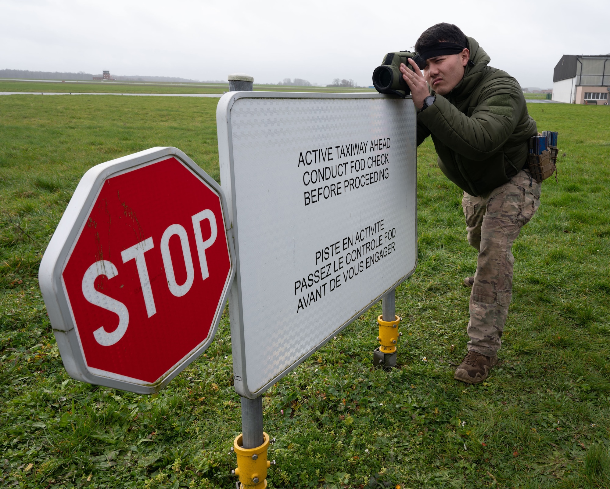 U.S. Air Force Staff Sgt. Gage Rutz, 435th Security Forces Squadron contingency Response team member, uses a laser rangefinder during training as part of Exercise Agile Bison at Chièvres Air Base, Belgium, March 12, 2023.