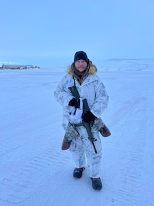 U.S. Army Staff Sgt. Shane Yuknis, cavalry scout for B Troop, 172nd Cavalry Squadron (MTN), 86th Infantry Brigade Combat Team (MTN), Vermont Army National Guard, before tactical insertion training at the airfield in Resolute, Nunavut, Canada, March 14, 2023.