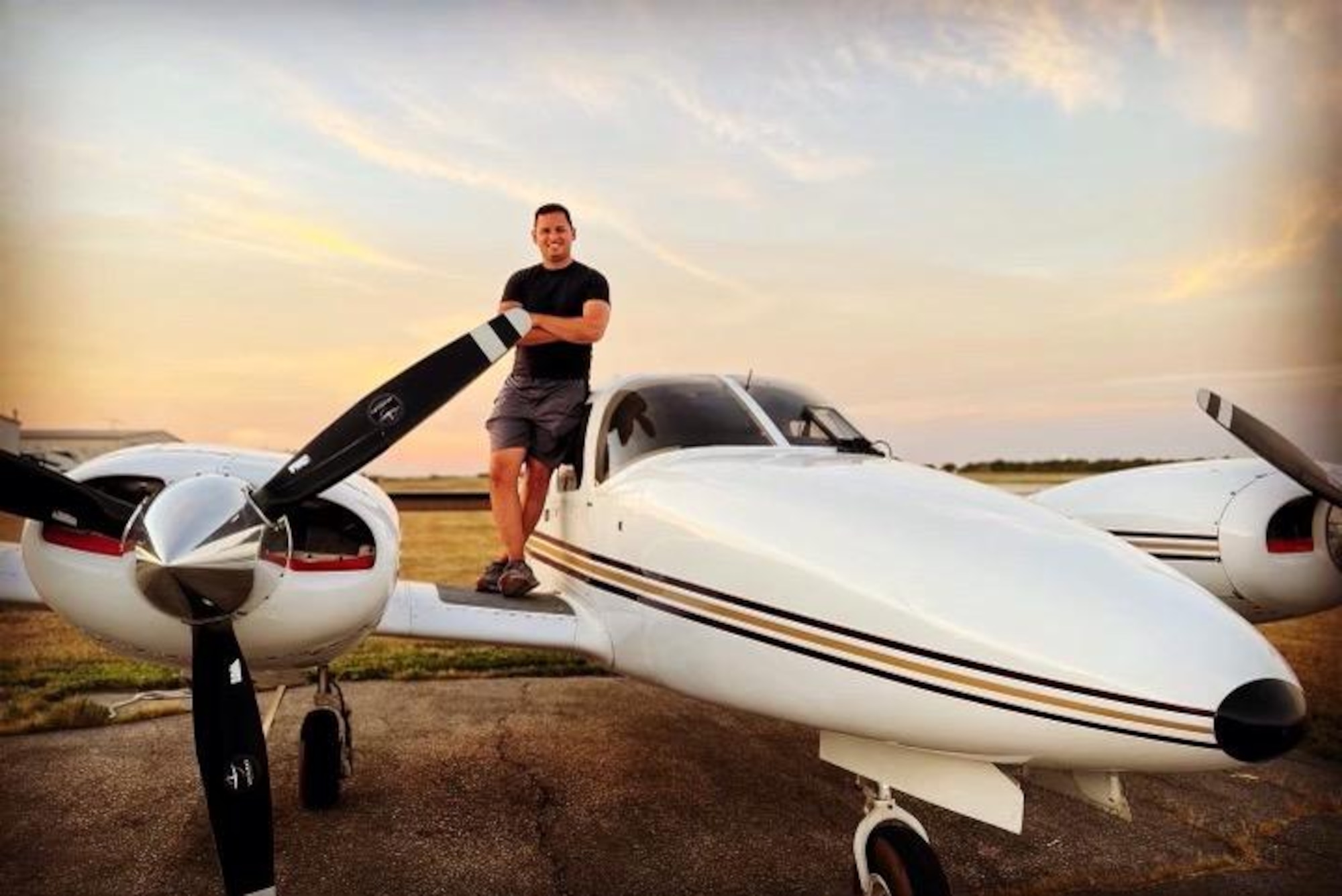 Maj. Leo Romero, 905th Air Refueling Squadron Chief of Tactics, poses with his private twin-engine aircraft.