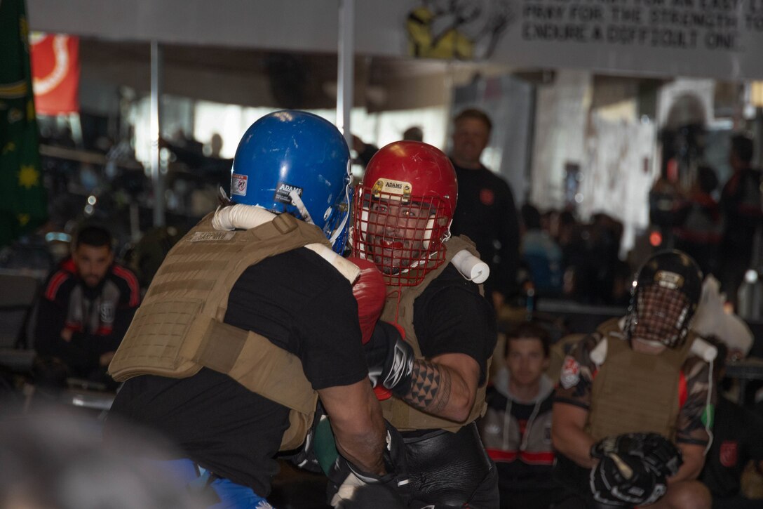 Rugby players from the San Diego Legion Rugby Team fight against each other during Marine Corps Martial Arts Program training at Marine Corps Air Ground Combat Center (MCAGCC), Twentynine Palms, California, Jan. 20, 2023. The team visited MCAGCC to improve unit cohesion, morale, and train in a different environment to improve their performance. (U.S. Marine Corps photo by Lance Cpl. Anna Higman)