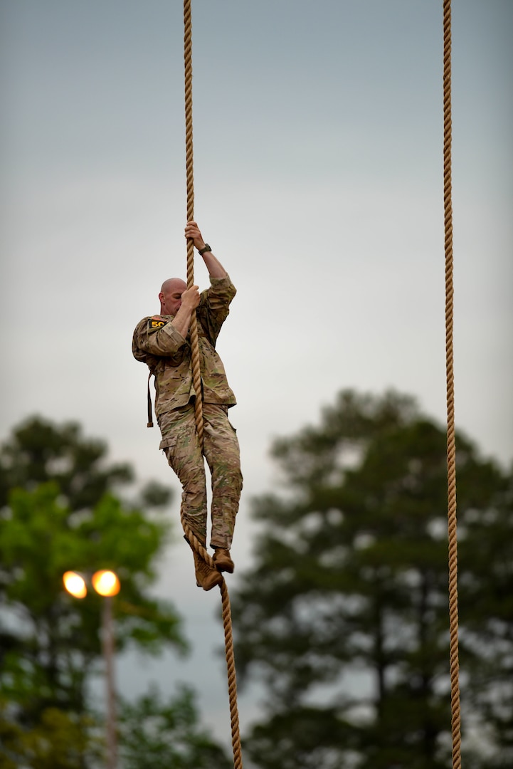 First Sgt. John Melson, then a Sgt. 1st Class with the Massachusetts National Guard, climbs the ropes at Malvesti Field during the 2016 all-Army Best Ranger Competition at Fort Benning, Ga., April 15, 2016. Melson, now a member of the Georgia National Guard, will be featured in the new U.S. Army recruiting campaign commercials.