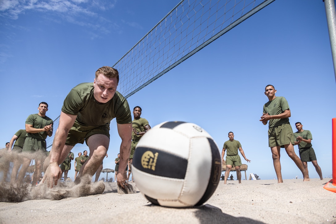 U.S. Marines with Combat Logistics Regiment 17, 1st Marine Logistics Group, I Marine Expeditionary Force, participate in a beach physical training session on Camp Pendleton, California, Aug. 12, 2022. The regimental PT was held to boost morale and camaraderie throughout the regiment. (U.S. Marine Corps photo by Cpl. Aldo Sessarego)