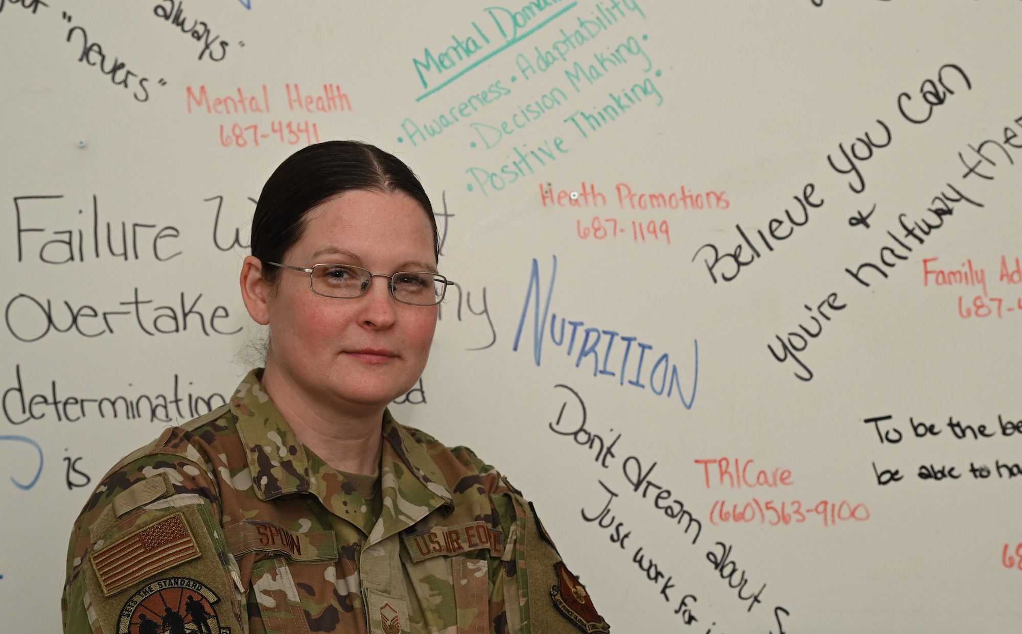 MSgt. Melissa Spoon, 509th Bomb Wing Resiliency Coordinator, poses for a photo at Whiteman Air Force Base, Missouri, March 3, 2023. Spoon shared her story on how developing resiliency in her life set herself up for success as a resiliency coordinator. (U.S. Air Force photo by Airman 1st Class Joseph Garcia)