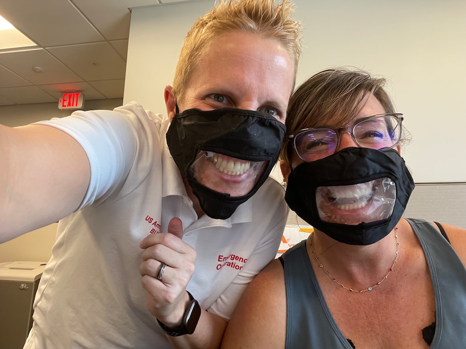 ALBUQUERQUE, N.M. – Karyn Matthews, emergency management specialist, left, and Summer Schulz, biologist in the district’s Environmental Studies Unit, try out some unique masks during the mask mandate, Aug. 9, 2022. Photo by Karyn Matthews.