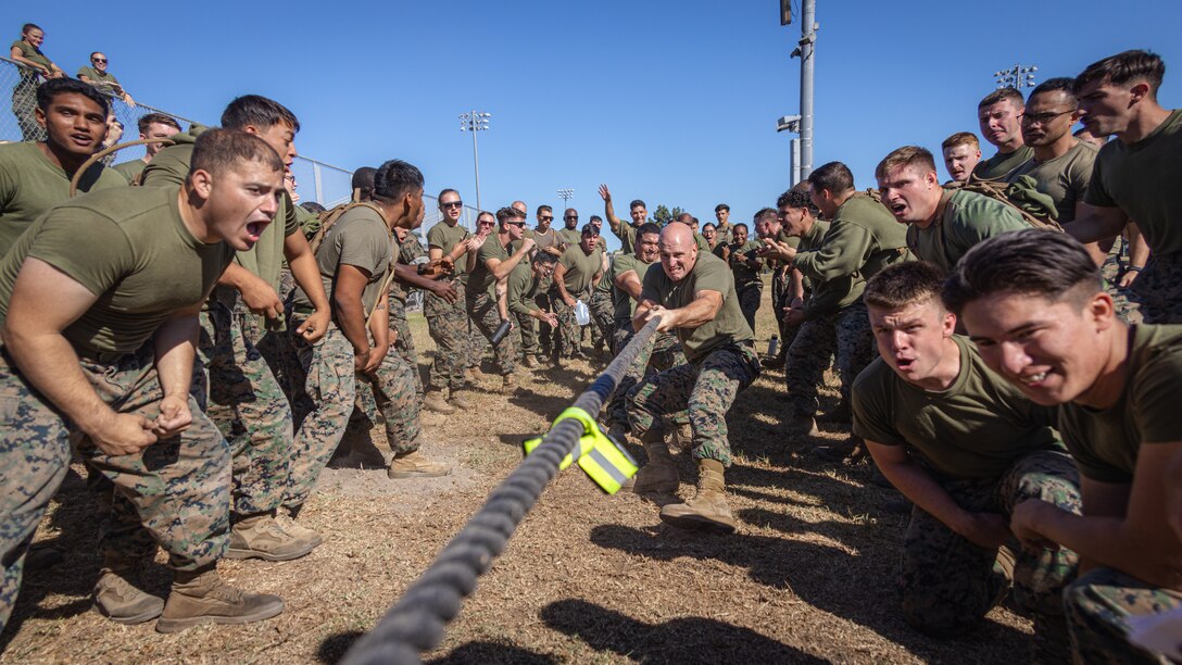 U.S. Marines with Combat Logistics Battalion 1, 1st Marine Logistics Group, I Marine Expeditionary Force, participate in a tug of war match during a battalion field meet on Camp Pendleton, California, Oct. 28, 2022. The field meet was held to boost morale and camaraderie throughout the battalion. (U.S. Marine Corps photo by Sgt. Aldo Sessarego)