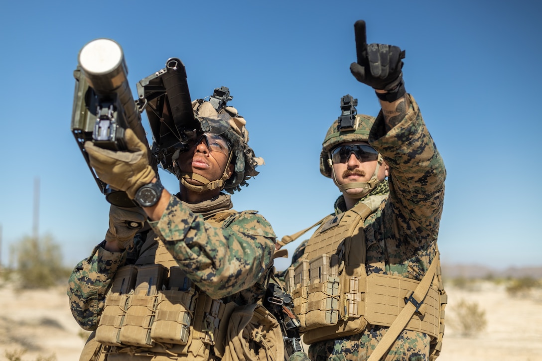 U.S. Marine Corps Pfc. Joshua Hudson, left, and U.S. Marine Corps Sgt. Dylan Good, both low-altitude air gunners with 3rd Littoral Anti-Air Battalion, 3rd Marine Littoral Regiment, 3rd Marine Division, set security with an FIM-92 Stinger during Marine Littoral Regiment Training Exercise at Marine Corps Air Station Yuma, Arizona, Feb. 6, 2023. MLR-TE is a large-scale, service-level exercise designed to train, develop, and experiment with the 3rd MLR as part of a Marine Air-Ground Task Force operating as a Stand-in Force across a contested and distributed maritime environment.