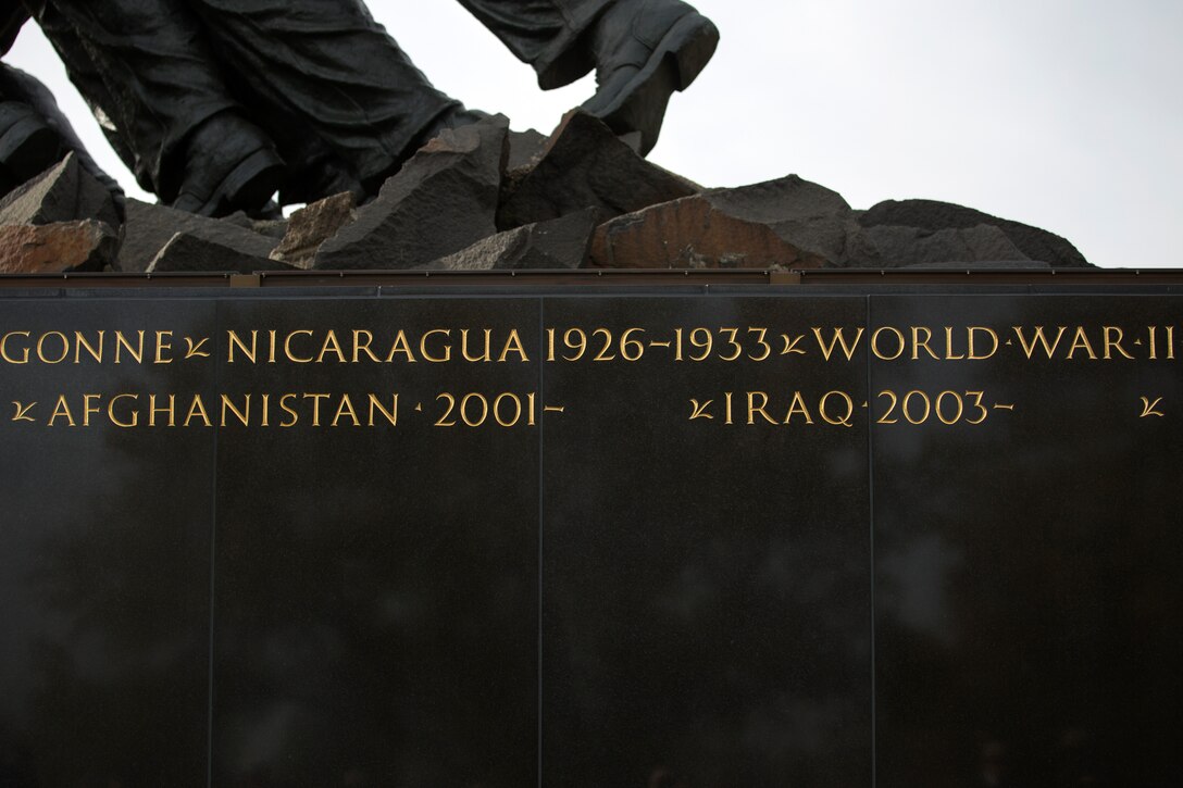 The National Park Service unveiled new engravings on the Marine Corps War Memorial in Arlington, Va. Nov. 11, 2017. The Afghanistan and Iraq engravings are the first on the monument since 1996. (U.S. Marine Corps photo by Cpl. Molly E. Hampton)