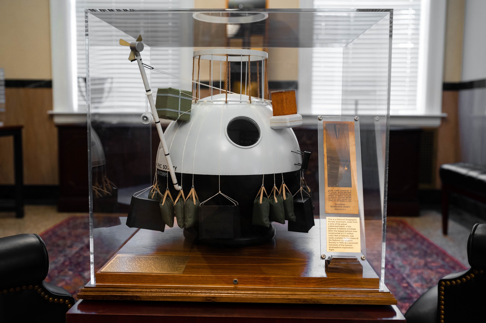 A model of the U.S. Army Air Corps Explorer II balloon sits on display at the 375th Air Mobility Wing headquarters building on March 6, 2023. Marc Hornkohl of the American Model Builders and Kris Matthews, 375th AMW historian, delivered a model of the U.S. Army Air Corps Explorer II balloon to the 375th Air Mobility Wing Headquarters, adding to the collection of the wing heritage program. (U.S. Air Force photo by Airman 1st Class De’Quan Simmons)