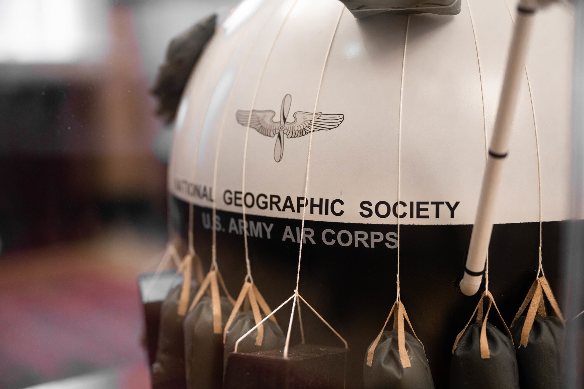 A model of the U.S. Army Air Corps Explorer II balloon sits on display at the 375th Air Mobility Wing headquarters building on March 6, 2023. Explorer II was part of a partnership between the U.S. Army Air Corps and the National Geographic Society, and its mission was to collect data on the composition of the atmosphere. (U.S. Air Force photo by Airman 1st Class De’Quan Simmons)