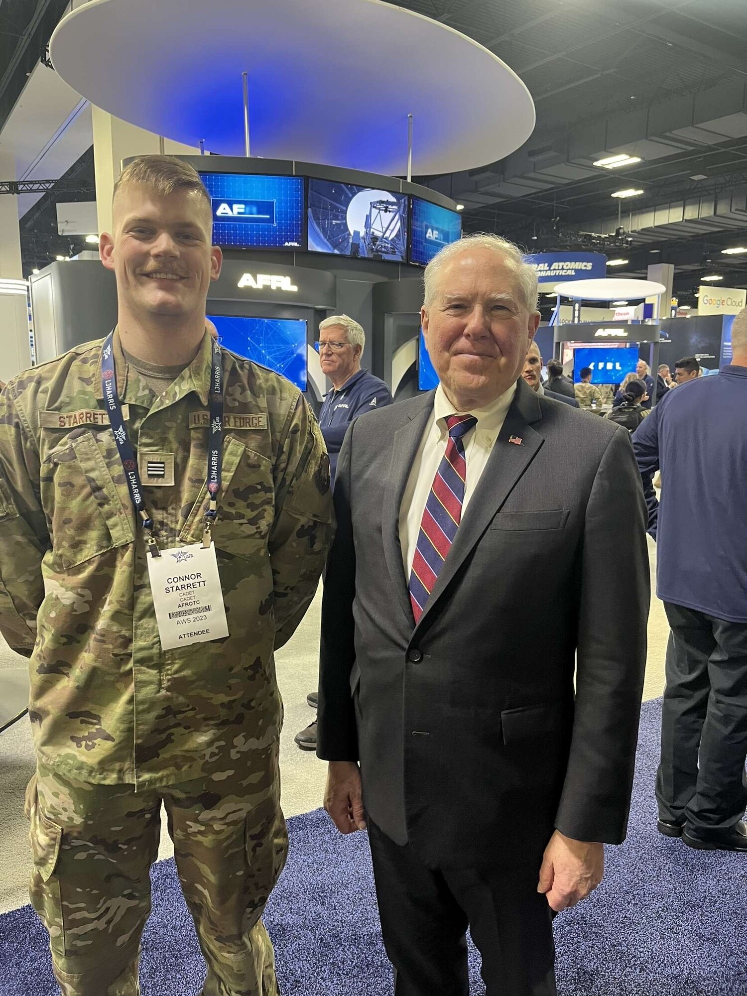 Cadet Connor Starrett from Air Force ROTC Detachment 780 at South Dakota State University meets Secretary of the Air Force Frank Kendall (right) at the Air and Space Forces Association Air Warfare Symposium, Aurora, Colorado, March 6, 2023. Cadets had the opportunity to meet senior Air and Space Force leadership at the symposium.