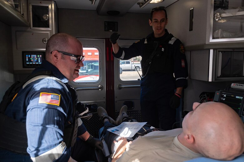 person in paramedic vehicle