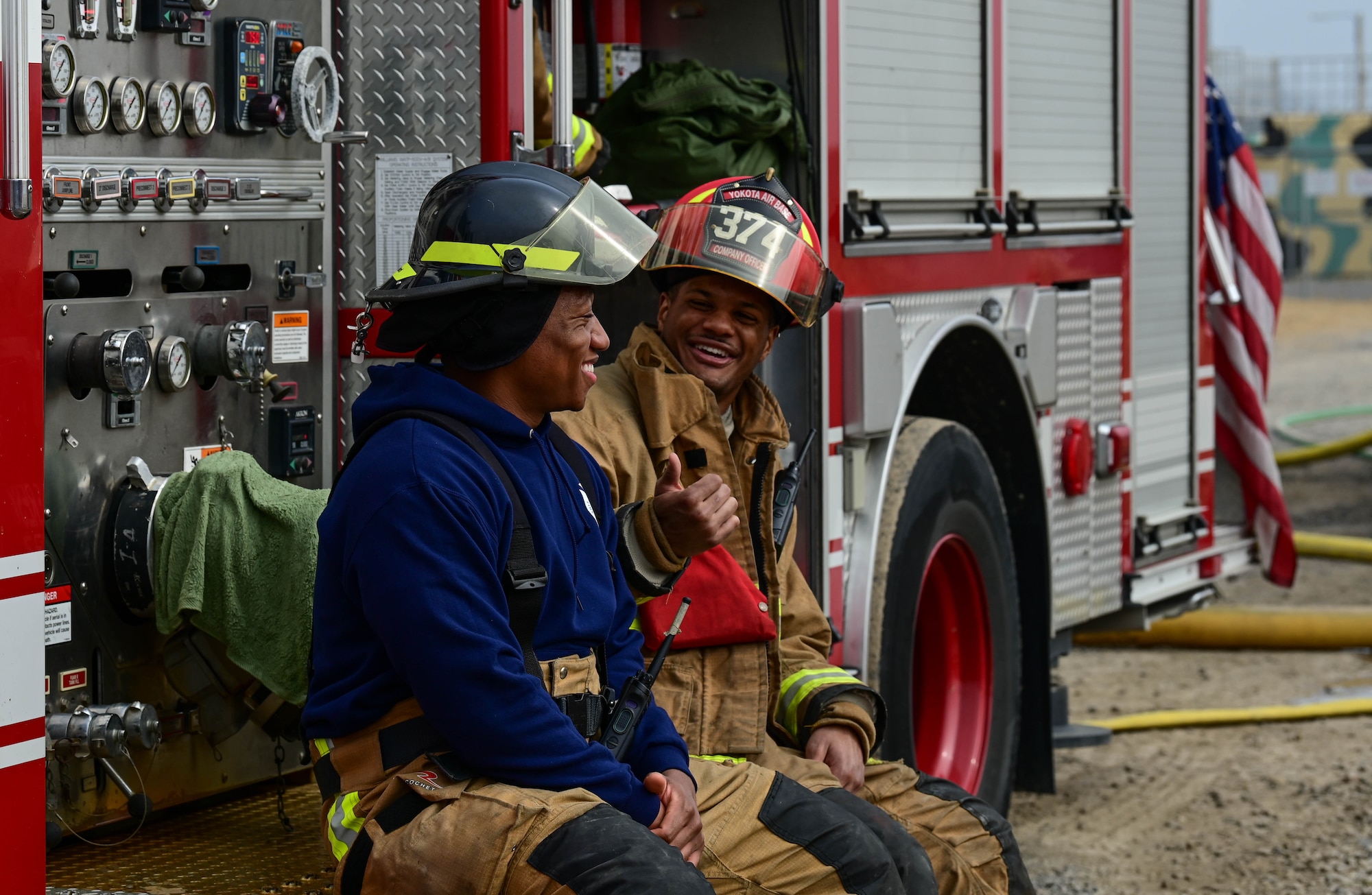 U.S. Air Force Senior Airman Charles Nettles III (left), and Staff Sgt. Thomas Leno, 8th Civil Engineer Squadron firefighters, chat before a joint training exercise with U.S. Marine Corps firefighters at Kunsan Air Base, Republic of Korea Mar. 9, 2023. The event allowed the USMC Corps and USAF firefighters to exchange knowledge and sharpen each other’s skill sets. (U.S. Air Force photo by Senior Airman Shannon Braaten)