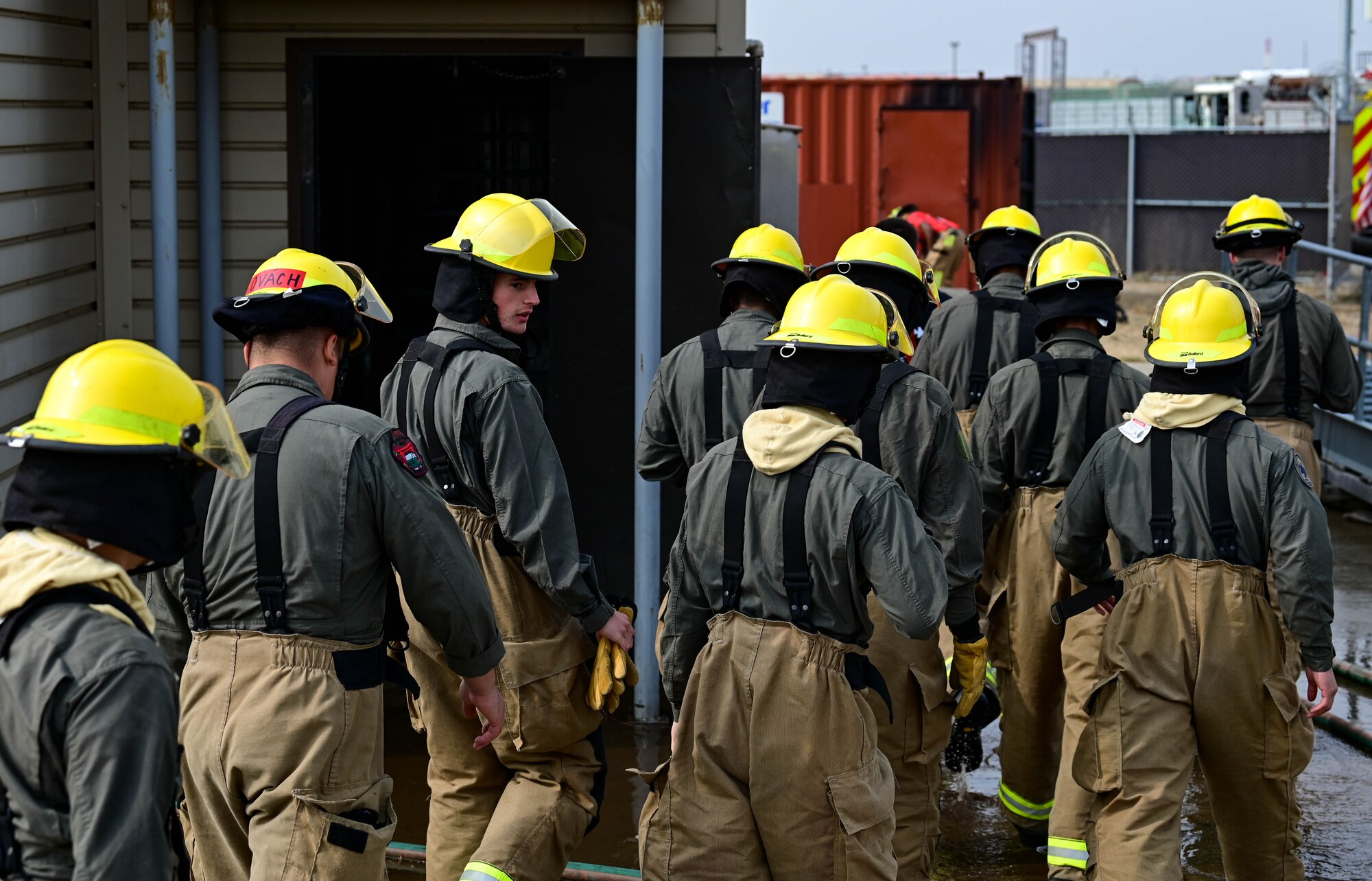 U.S. Marine Corps Cpl. Ronald Thomas, Marine Wing Support Squadron 172 firefighter, looks at fellow Marines during a joint training exercise at Kunsan Air Base, Republic of Korea Mar. 9,
2023. Firefighters train year-round on various techniques such as fire suppression, aviation fire suppression, hazardous materials and emergency medical services to maintain their technical expertise. (U.S. Air Force photo by Senior Airman Shannon Braaten)