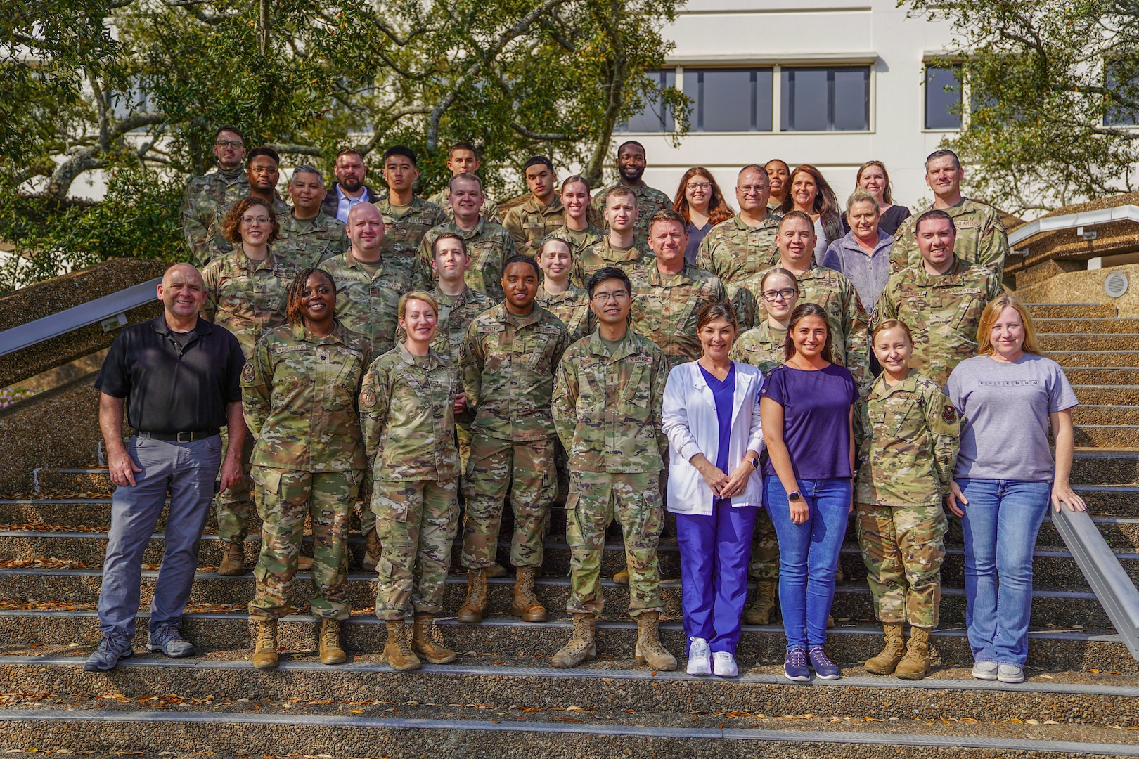 The members from the 81st Medical Diagnostic and Therapeutics Squadron pose for photo outside of the Keesler Medical Center at Keesler Air Force Base, Mississippi, Feb. 28, 2023.