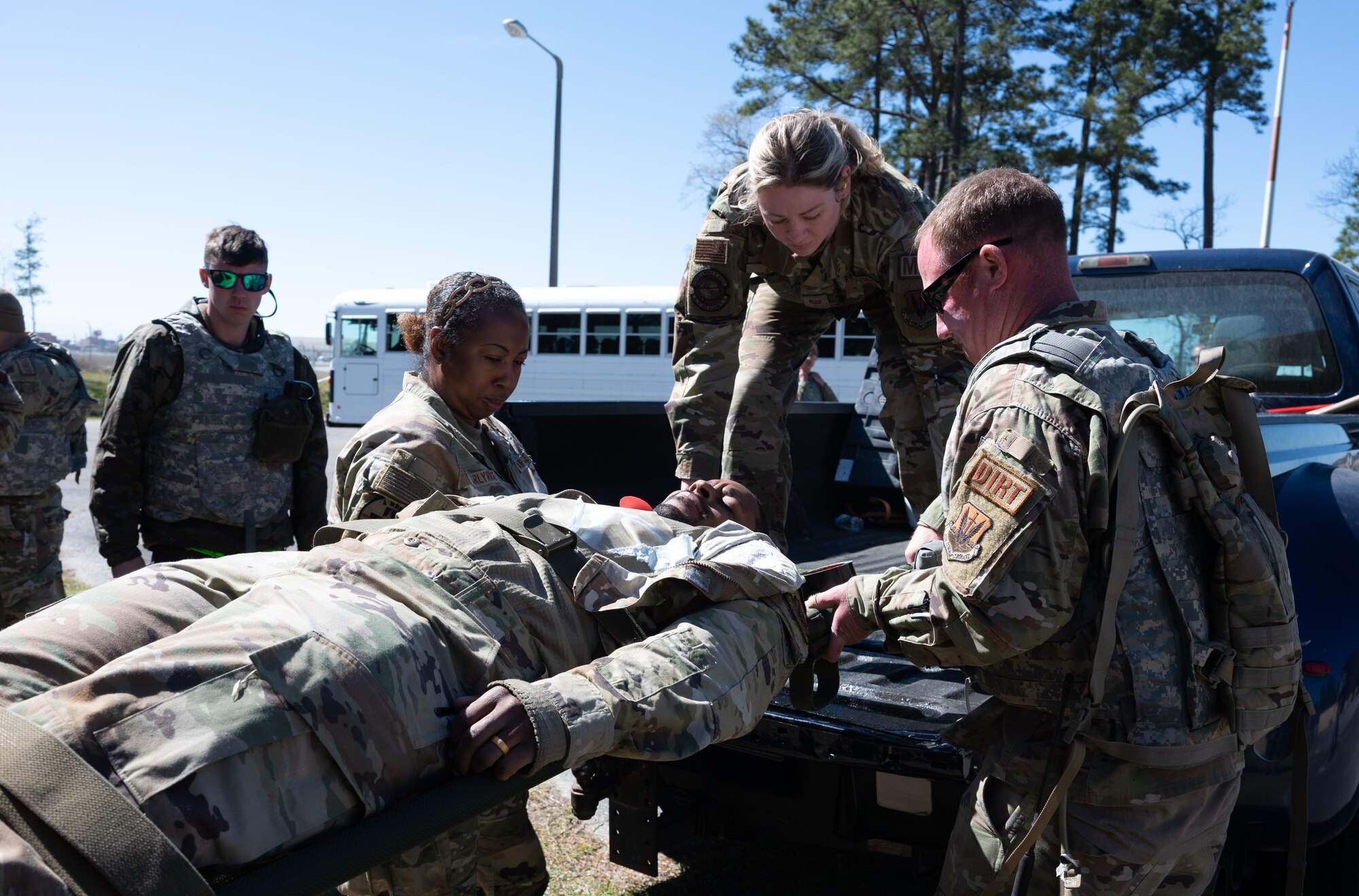 Airmen assigned to the 4th Fighter Wing load a simulated patient into a truck for aeromedical evacuation transport as part of a mass casualty event during exercise Agile Cub 4 at Marine Corps Air Station Cherry Point, North Carolina, March 8, 2023. The exercise scenario allowed medics assigned to the 4th Medical Group to receive advanced combat medical training in a deployed environment to ensure they are ready for any incident. This agile combat employment exercise shifts the generation of airpower from large, centralized bases to networks of smaller, dispersed locations.