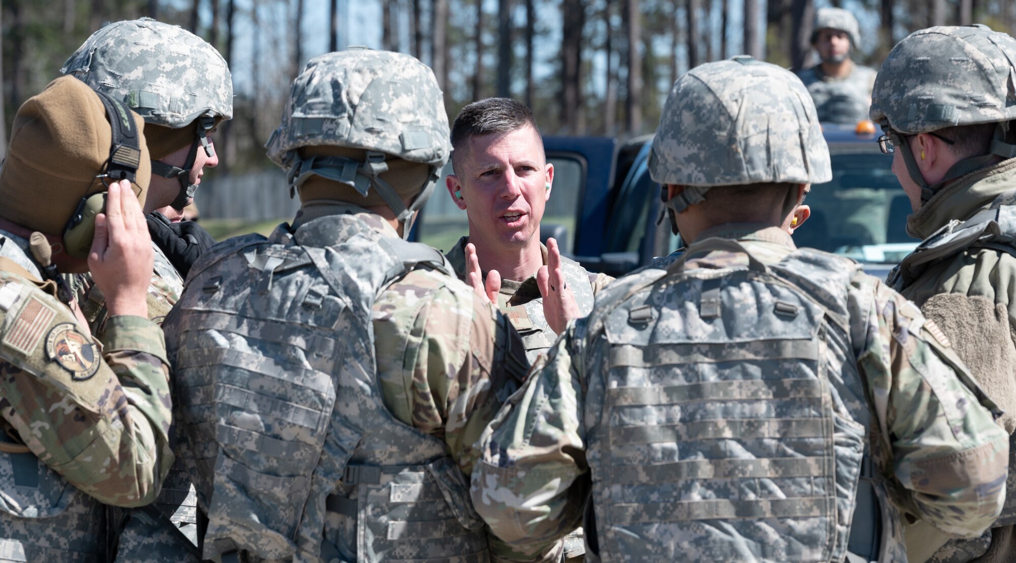 Chaplain (Capt.) David Shrader, 4th Air Base Squadron chaplain, gives a brief to multi-capable Airmen as part of a mass casualty event during exercise Agile Cub 4 at Marine Corps Air Station Cherry Point, North Carolina, March 8, 2023. This agile combat employment exercise shifts the generation of airpower from large, centralized bases to networks of smaller, dispersed locations.