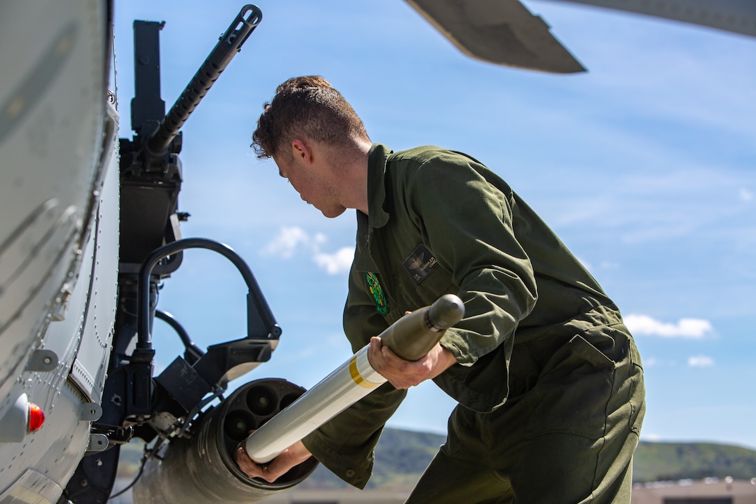 U.S. Marine Corps Lance Cpl. Evan Thuemmler, an ordnance technician with Marine Light Helicopter Attack Squadron 775 (HMLA-775), loads a 2.75” high explosive rocket onto a UH-1Y Venom aircraft at Marine Corps Air Station Camp Pendleton, March 8, 2023.
HMLA-775 flew sorties from MCAS Camp Pendleton to the San Clemente Island Range Complex in support of the Marine Forces Reserve Tactical Air Control Party (TACP) exercise held from February 26 to March 11. The exercise implemented concepts of Force Design 2030, a call to modernize the Marine Corps’ warfighting doctrine, via expeditionary advanced based operations such as a limited-footprint forward arming and refueling point and hot ordnance loading evolutions to reduce downtime between sorties and build joint fires proficiency.