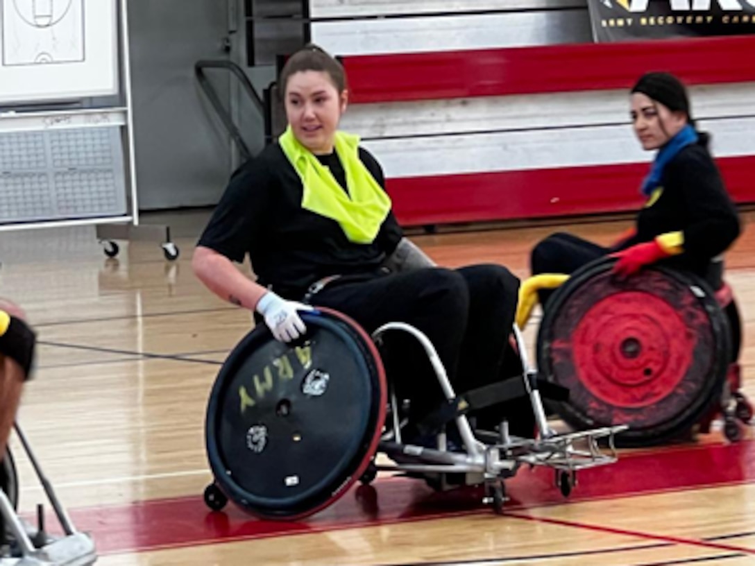 (Photo by MaryTherese Griffin) Captain Jessica Campion and Sgt Finlahy Cortez-Powers in a scrimmage at wheelchair rugby camp.