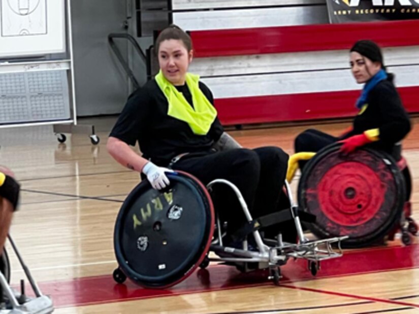 (Photo by MaryTherese Griffin) Captain Jessica Campion and Sgt Finlahy Cortez-Powers in a scrimmage at wheelchair rugby camp.