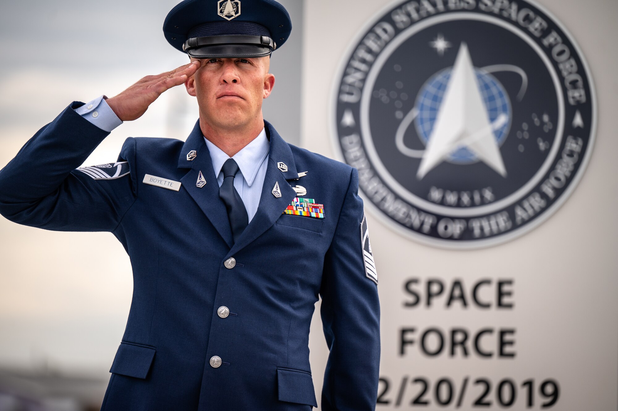 U.S. Space Force Master Sgt. David Boyette, chief of operations for the Regional Satellite Communications Support Center-East, salutes the American flag during the Beirut Peacekeepers Tower Groundbreaking ceremony at the William R. Gaines Jr. Veterans Memorial Park in Port Charlotte, Florida, March 15, 2023. Servicemembers from all service branches attended the ceremony to show their support and honor those who paid the ultimate sacrifice in Beirut from 1982 to 1984. (U.S. Air Force photo by Tech. Sgt. Alexander Cook)
