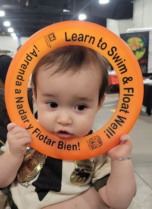 ALBUQUERQUE, N.M. – Junior ranger Charlie Bo is learning at a young age that water safety is important. He attended the New Mexico Outdoor Adventure Show and stopped by the district’s Water Safety Education Booth, Feb. 13, 2023. Photo by Gary Cordova.