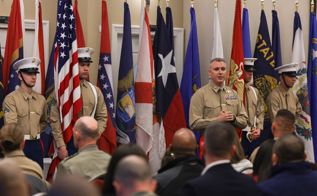 U.S. Marine Corps Col. Richard J. Schmidt, commanding officer of Headquarters Battalion, Training and Education Command, addresses attendants to the HQBN, TECOM Relief and Appointment and Retirement ceremony on Marine Corps Base Quantico, Virginia, March 10, 2023. U.S. Marine Corps Sgt. Maj. Chester Wilson III retires after honorably serving in the U.S. Marine Corps for 30 years, undertaking three successful tours of recruiting duty and deploying to Iraq and Afghanistan. (U.S. Marine Corps photo by Lance Cpl. David Brandes)
