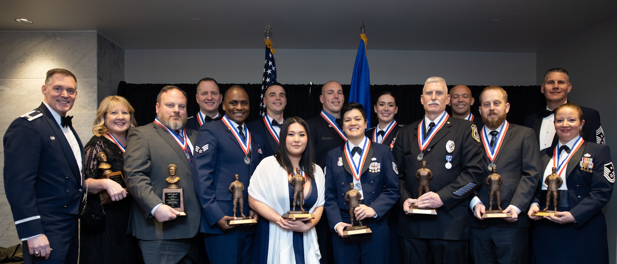 Group of award winners posing for group photo.