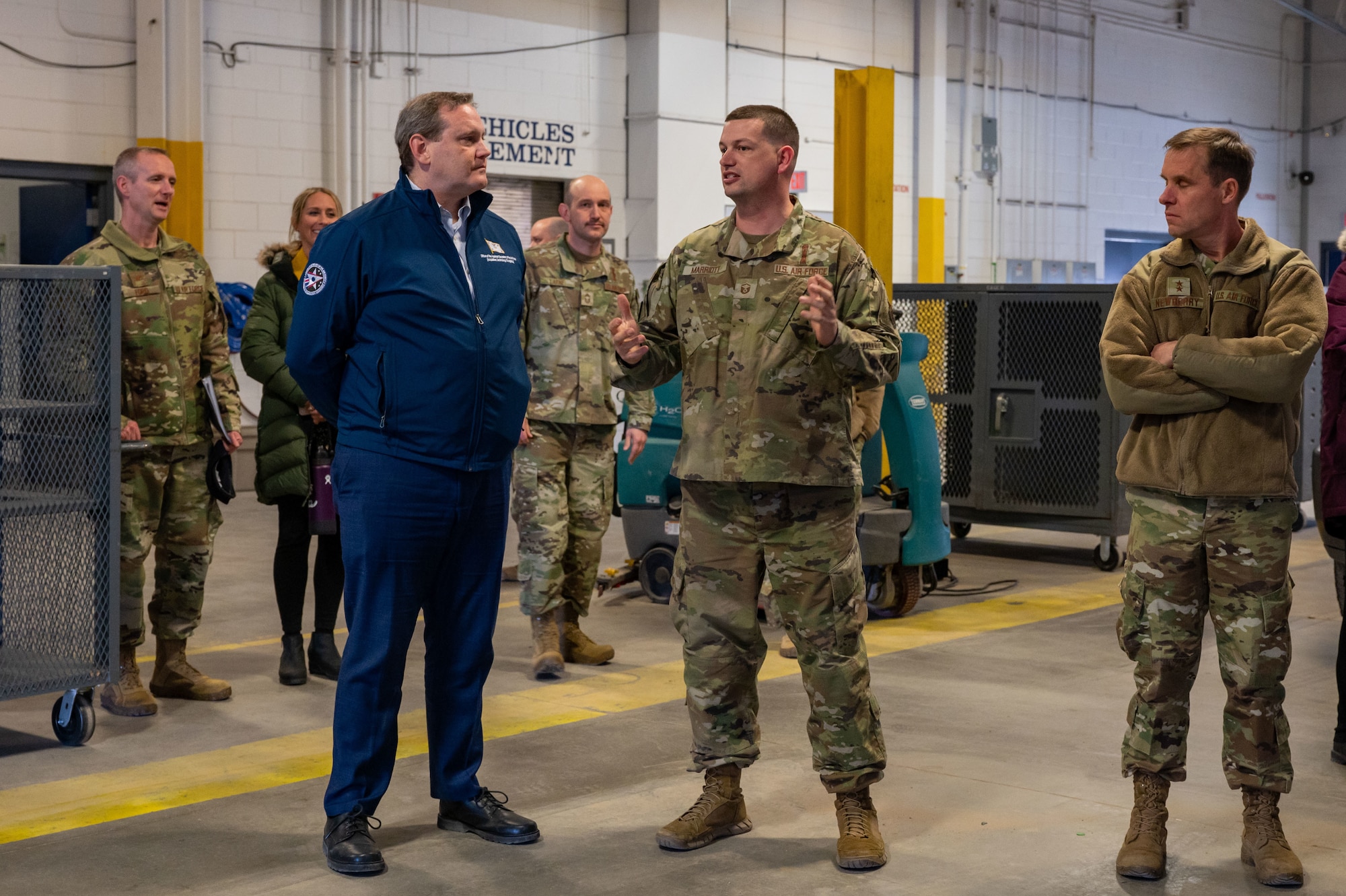 Honorable Andrew Hunter talks to Master Sgt. Marriot about obstacles faced by maintenance.