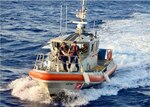 The crew of the USCGC Myrtle Hazard (WPC 1139) transfers two mariners rescued from the water about halfway between Guam and Rota midday on Feb. 9, 2023, to a Station Apra Harbor 45-foot Response Boat-Medium for further transport to shore. The crew responded to a mayday call from the master of the 42-foot vessel Senor Dung on Feb. 8 along with other federal and local responders.