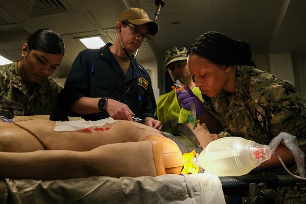 SAN DIEGO (March 8, 2023) – Hospital Corpsman 2nd Class Jazmine Strain, assigned to Navy Medicine Readiness and Training Command San Diego (NMRTCSD) and a native of Claxton, Georgia, inserts a tracheal tube into the mouth of a simulated trauma patient during a mass casualty drill aboard USS Boxer (LHD 4). Boxer, Fleet Surgical Team Five and NMRTCSD Sailors participated in a two-day mass casualty drill simulating Boxer as a casualty receiving treatment ship. Boxer is a Wasp-class amphibious assault ship homeported in San Diego. (U.S. Navy photo by Mass Communication Specialist 1st Class Kelsey J. Hockenberger)