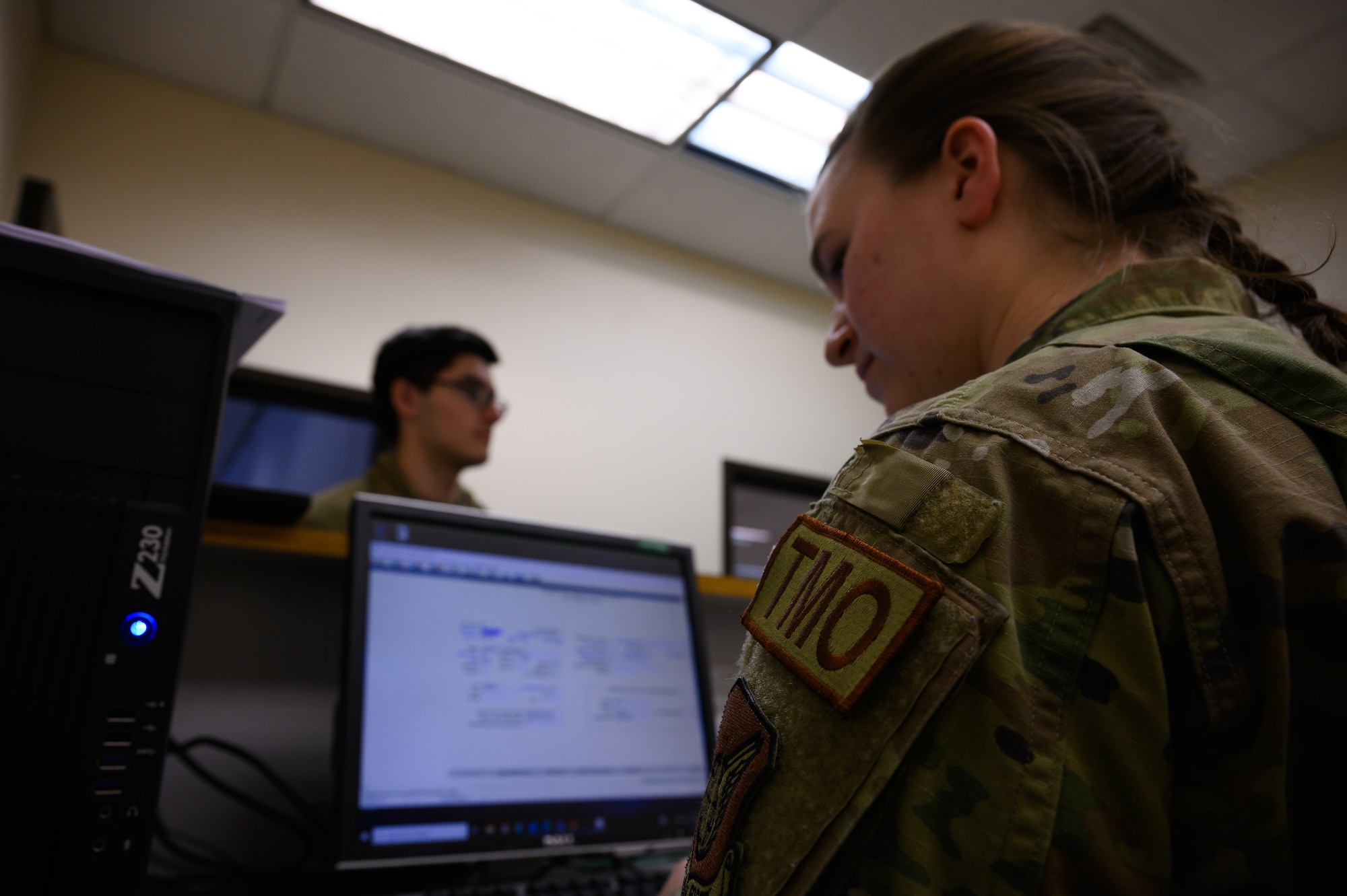 U.S. Air Force Airman 1st Class Hailey Maher, 354th Logistics Readiness Squadron personal property technician, manifests an Airman assigned to the 354th Fighter Wing going through the Personnel Deployment Function line during exercise Arctic Gold 23-1 at Eielson Air Force Base, Alaska, March 7, 2023.