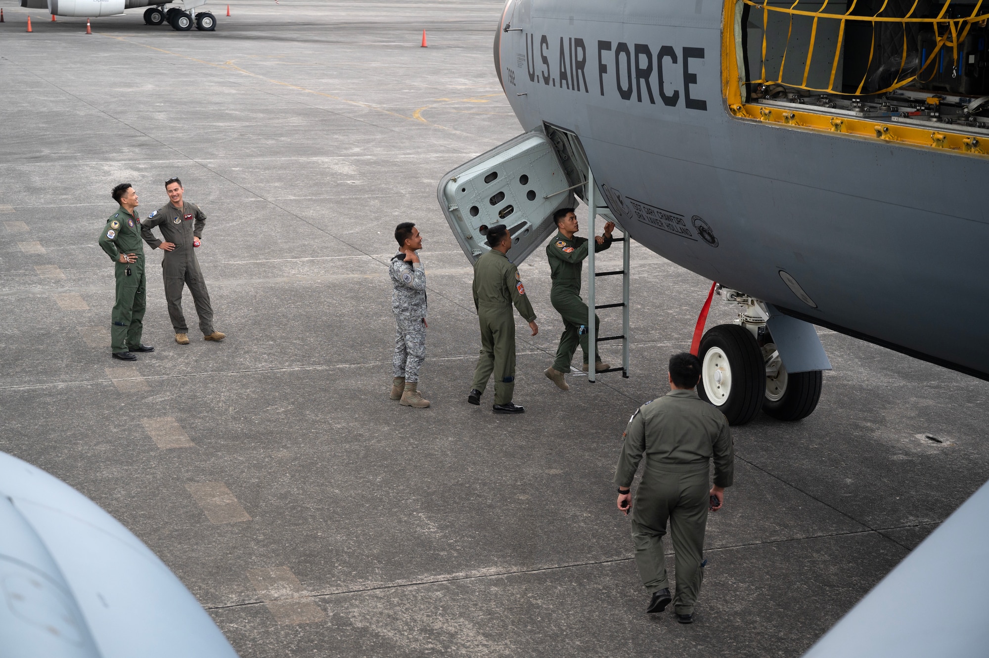 Members of the Philippine Air Force board a KC-135 Stratotanker assigned to the 909th Air Refueling Squadron during a static jet tour at Clark Air Base, Philippines, March 13, 2023. Enhancing interoperability between the U.S. and Philippine air forces contributes to the long-term advancement of our nations’ shared interest in maintaining a free and open Indo-Pacific. (U.S. Air Force photo by Senior Airman Jessi Roth)