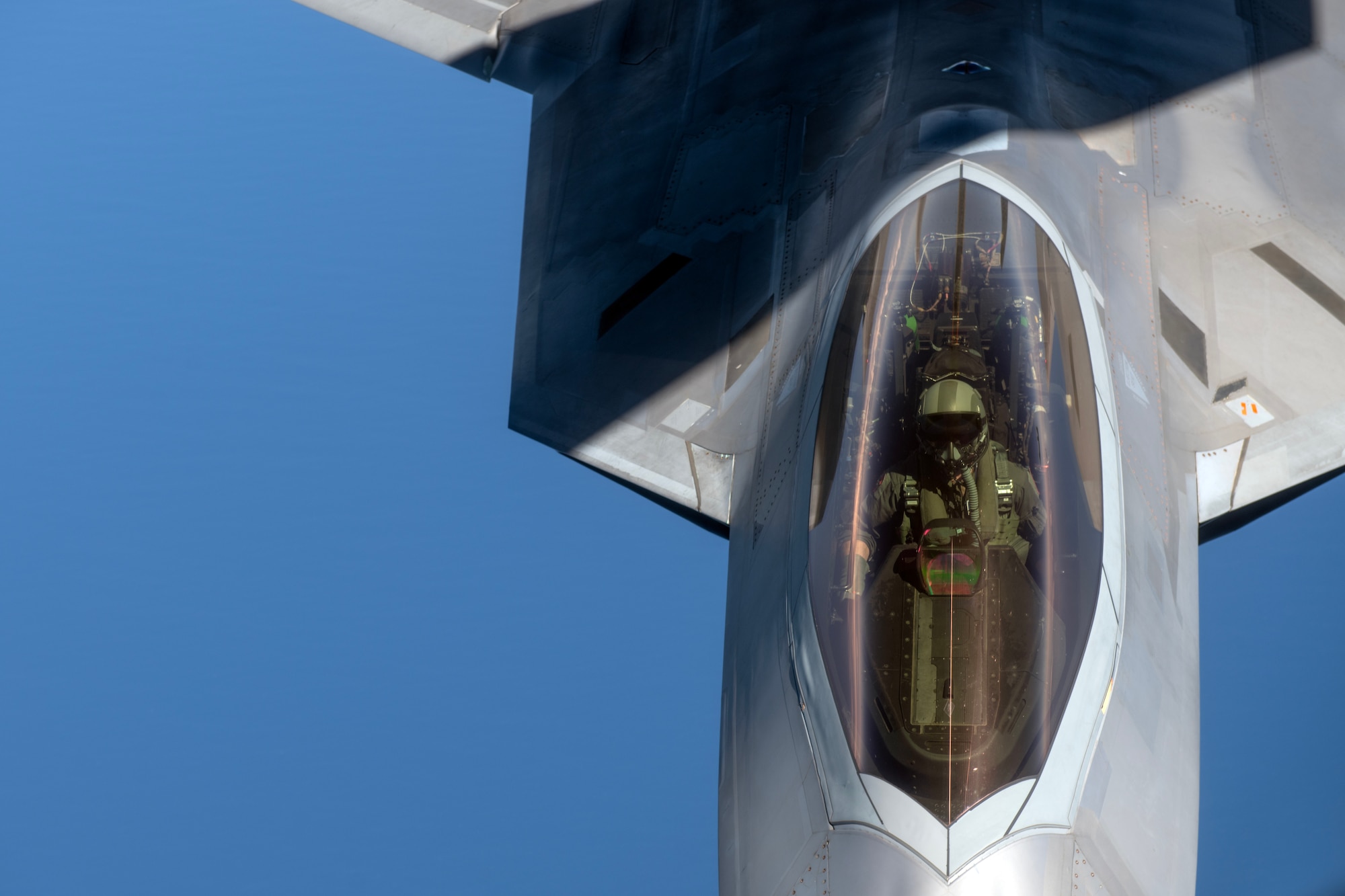 An F-22A Raptor assigned to the 525th Fighter Squadron approaches a KC-135 Stratotanker to receive aerial refueling over the South China Sea, March 14, 2023, in support of a bilateral training mission with the Philippine Air Force. Bilateral training and cooperation with our Philippine Air Force counterparts enhances the mutual readiness required to defend security, prosperity, and peace throughout the Indo-Pacific region. (U.S. Air Force photo by Senior Airman Jessi Roth)