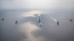 Participant ships of joint training exercise La Pérouse 2023 sail in formation in the Bay of Bengal, March 14. La Pérouse is a multilateral exercise designed to enhance cooperation in the field of maritime surveillance, interdiction operations and air operations by progressive training and information sharing. The Independence-variant littoral combat ship USS Charleston (LCS 18), part of Destroyer Squadron 7, is on a rotational deployment, operating in the U.S. 7th Fleet area of operations to enhance interoperability with Allies and partners and serve as a ready-response force in support of a free and open Indo-Pacific region.