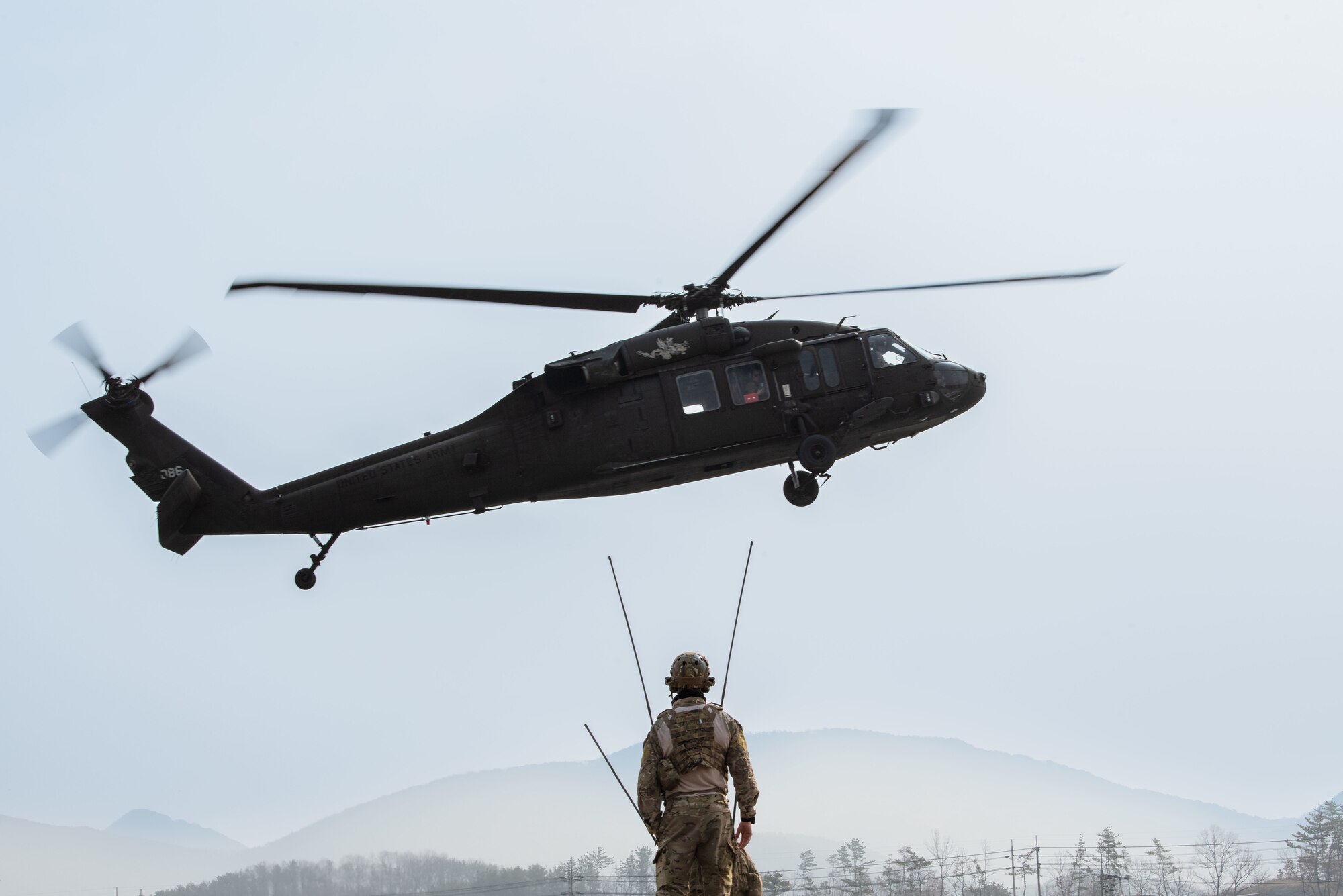 Photo of Airmen, Aircraft, operating on an alternate landing strip