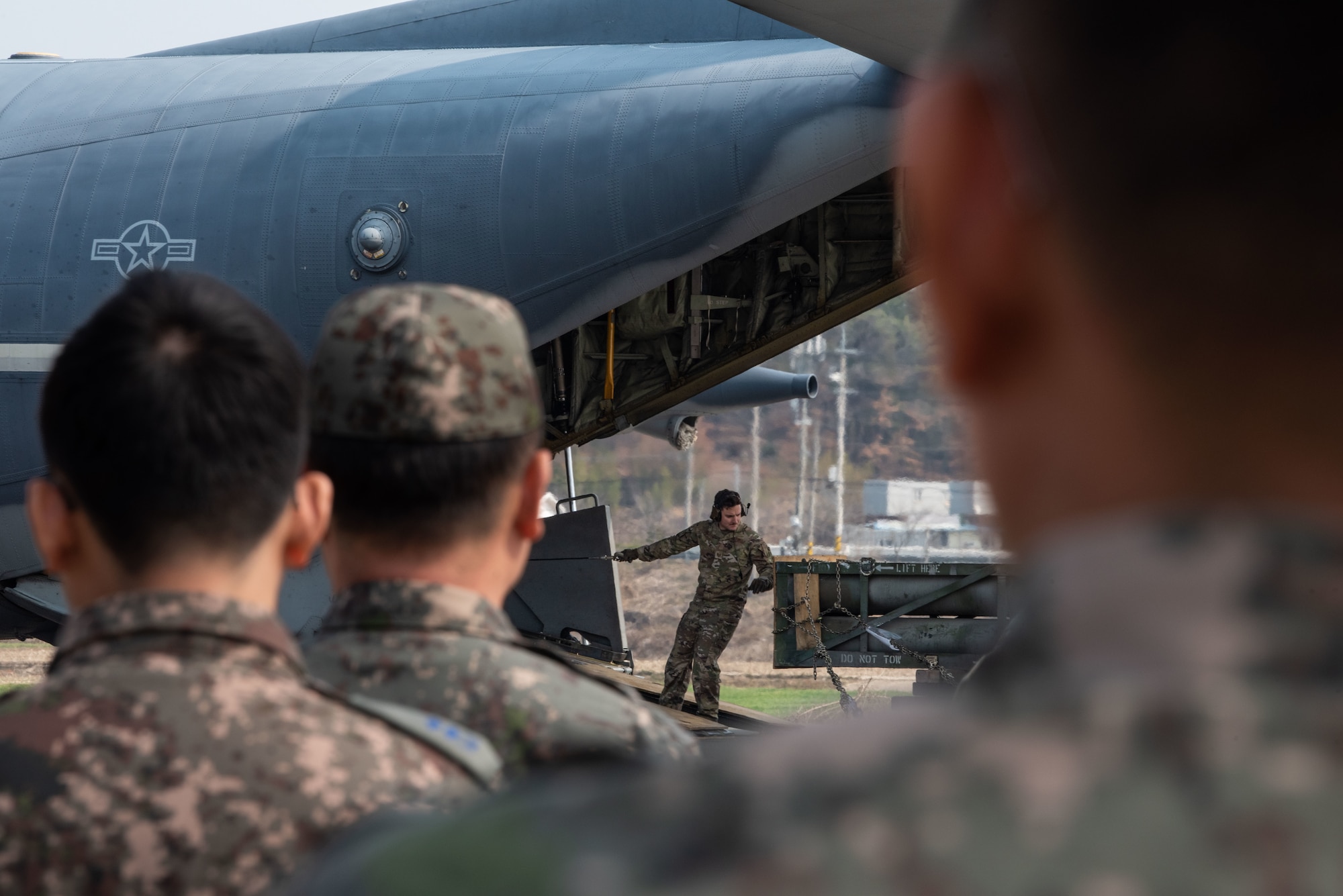 Photo of Airmen, Aircraft, operating on an alternate landing strip