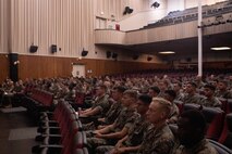 U.S. Marines with the 26th Marine Expeditionary Unit (MEU) attended a welcome aboard brief given by leaders of the 26th MEU at the base theater on Marine Corps Base Camp Lejeune, North Carolina, Sept. 22, 2022. Leaders from the 26th MEU welcomed new joins with an orientation brief about the unit, upcoming training exercises and expectations to prepare Marines for the upcoming deployment. (U.S. Marine photo by Cpl. Michele Clarke)