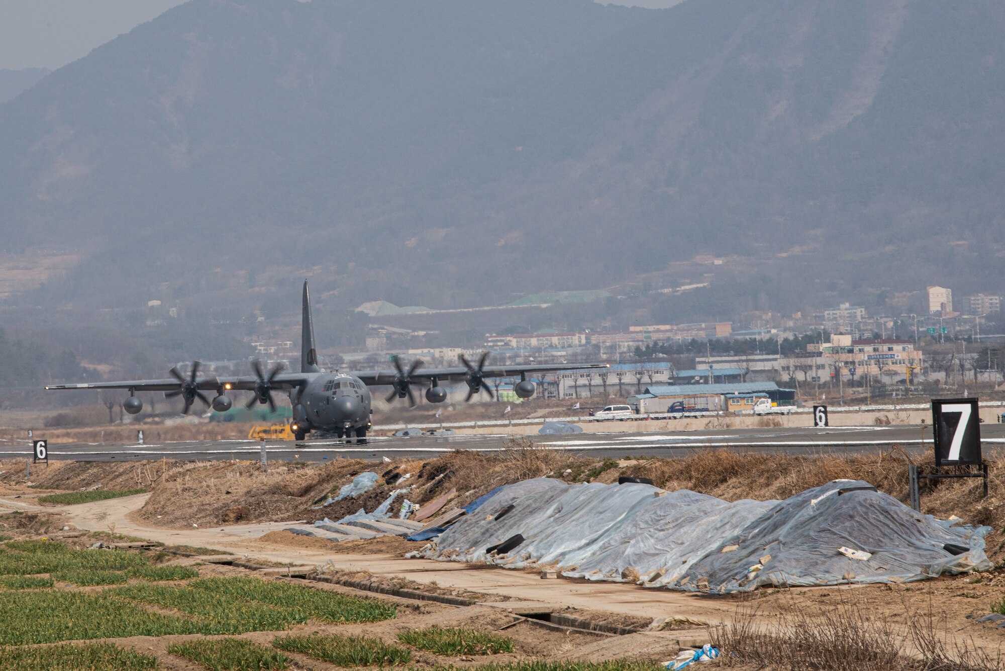 Photo of Airmen, Aircraft, operating on an alternate landing strip